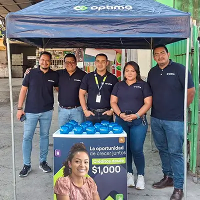 Optima representatives engaging at a local fair